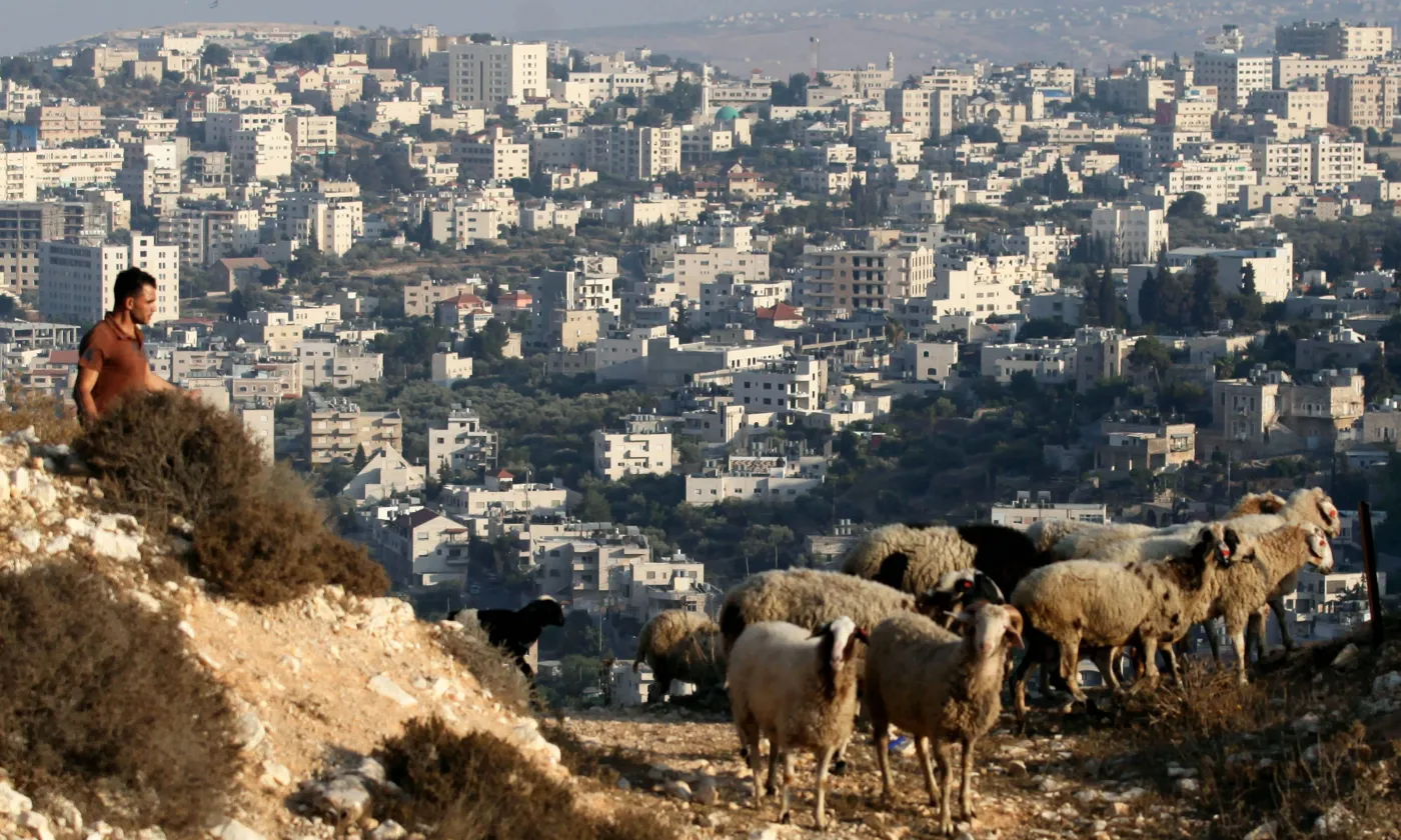 Un berger palestinien sur les hauteurs de Bethléem Keystone/ Abir Sultan